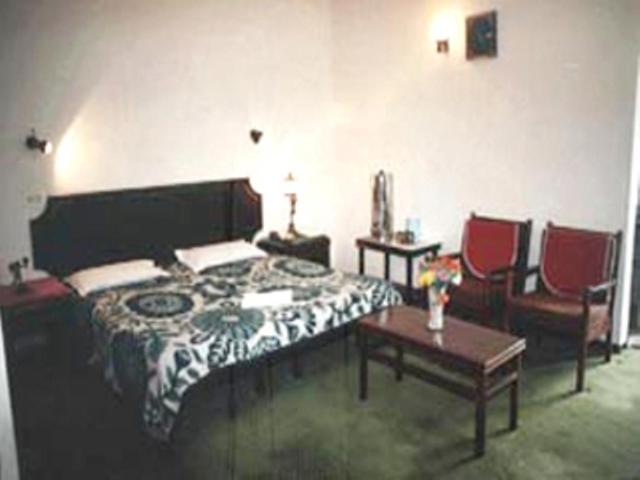 Hotel Preethi Palace Ooty Rum bild