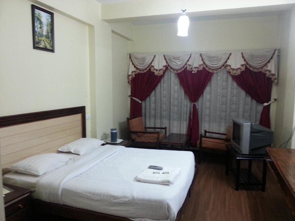 Hotel Preethi Palace Ooty Rum bild